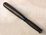 Long hardwood truncheon with ribbed grip stamped 'GR'